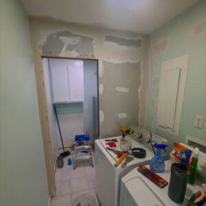 Laundry Room Renovation photo 4: Drywall installed on new wall in laundry room.