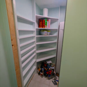 Laundry Room Renovation photo 7: Additional custom shelving added to the pantry to maximize storage of canned goods