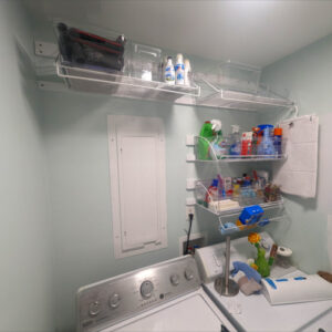 Laundry Room Renovation photo 8: French Cleat inspired wall supports for hanging wire shelving.